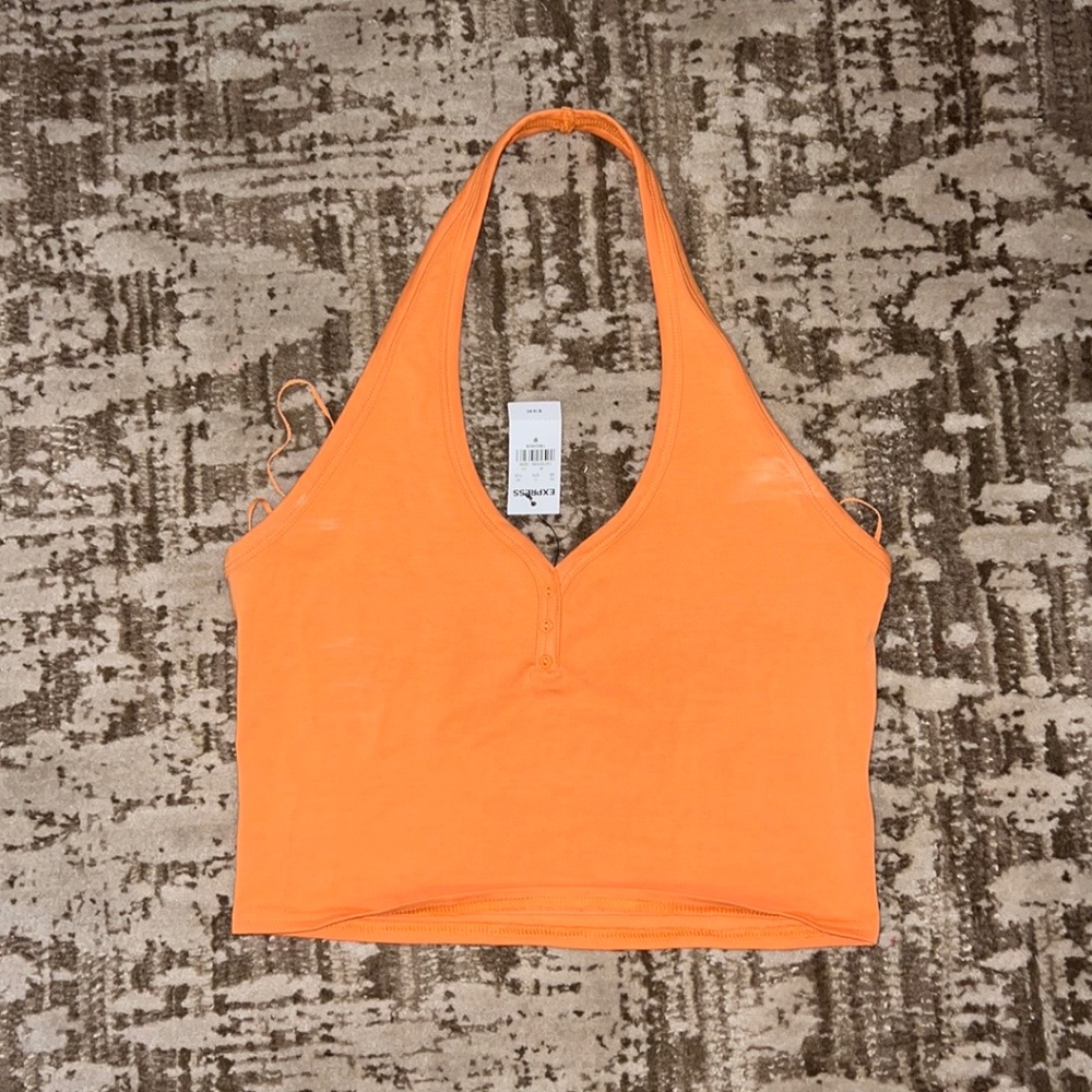 Waist length halter top. NEVER WORN